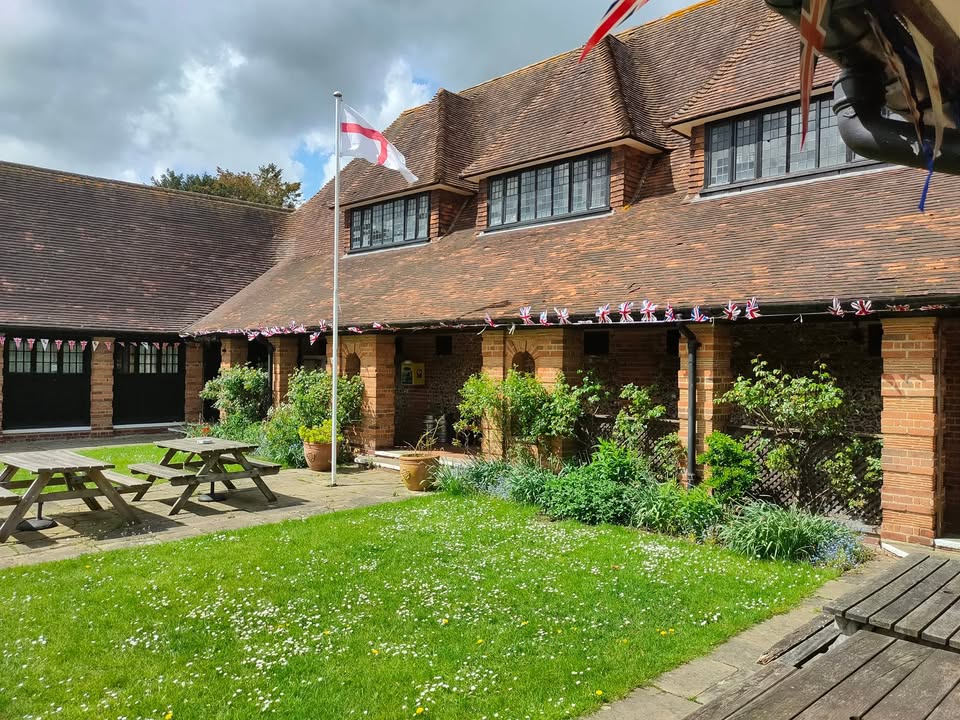The courtyard and club building on Nettlebed High Street